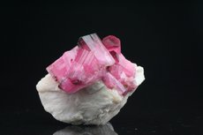 Fine pink Tourmaline Crystals on Feldspar