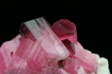 Fine pink Tourmaline Crystals on Feldspar