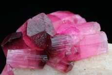 Fine pink Tourmaline Crystals on Feldspar