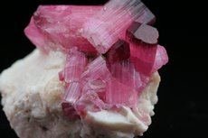 Fine pink Tourmaline Crystals on Feldspar