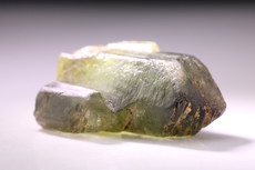 Peridot Crystal  Ludwigite inclusions
