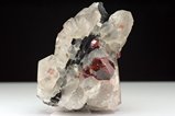 Spessartine Crystals on Quartz / Schorl