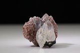 Spessartin Kristall umwachsen von Quarz