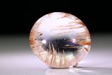Topaz Cabochon with Inclusions