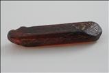 Red-brown elongated Doubly Terminated ジルコン (Zircon)
