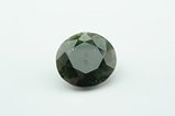 Faceted Ekanite round cut