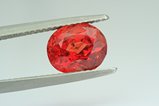 Faceted orangey -red Spinel 2,9 ct
